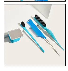 Detail view of professional hair styling tools set including brushes, combs and magnetic band.