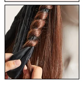 Heatless hair curler detail showing soft sponge styling rod wrapping brown hair easily.