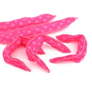 Bigoudis souples roses à pois pour dormir, outil de coiffure en mousse douce et pratique.