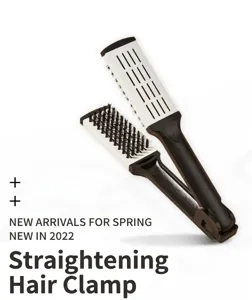 Detail view of the professional V-shaped hair straightening brush with bristle teeth for styling.