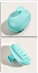 Blue silicone scalp massage brush, ergonomic handle, soft teeth for deep hair cleaning.