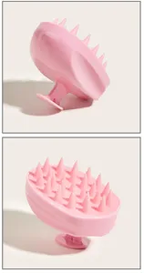 Detailed view of pink scalp massage brush, silicone shampoo brush for hair washing and relaxing.