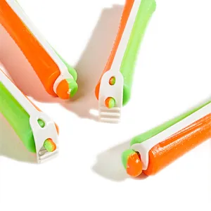 Professional hair perm rods with clips, colorful plastic curling rollers for salon styling.