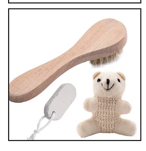Detail shot showcasing the wooden bath brush, pumice stone, and cute bear bath sponge.
