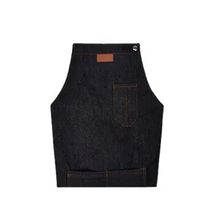 Durable denim kitchen apron with multiple pockets, stylish leather badge design for home cooking work.