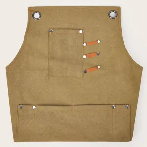 Canvas work apron with multi-pockets and metal grommets, detailed front view for durability.