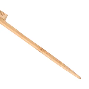 Natural bamboo hair highlighting brush and edge styling comb for professional salon styling.