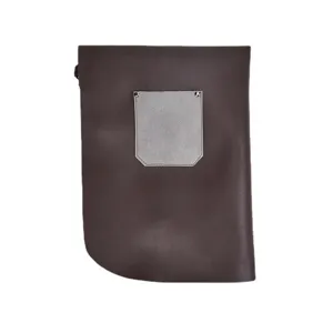 Vintage minimalist leather work apron for cooking, salon, and painting. Unisex styling main view.