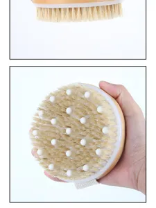 Wooden bath brush detail showing natural bristles and white massage beads for gentle cleaning.
