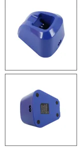 Detail view of blue hair clipper charging stand base showing bottom port and compatibility label.