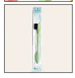 Cepillo verde de doble cara para bordes de cabello y cejas para un peinado preciso.