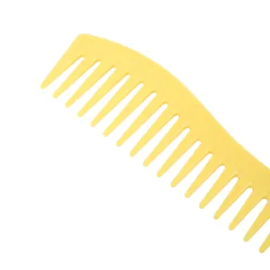 Yellow plastic wide tooth comb for daily hair styling and detangling, smooth teeth design.