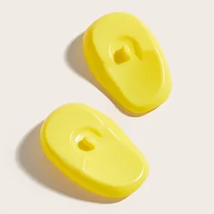 Yellow silicone hair dyeing ear protectors, waterproof protective ear caps, 2 pieces.