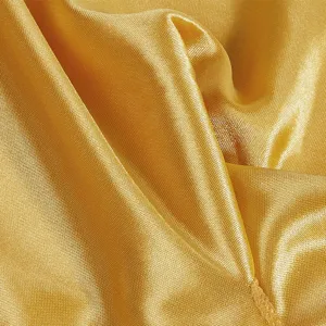 Golden satin headwrap fabric main image showcasing glossy breathable texture and fine folds