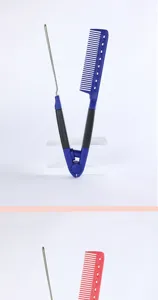 Detail shot of the V-shaped hair straightening styling comb with carbon fiber clamp and pin.