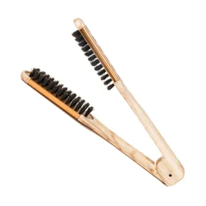 V-shaped hair straightening brush with natural boar bristles for smooth daily hair styling.