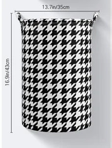Panier à linge en tissu pied-de-poule noir et blanc détail, corbeille pliable avec poignées.