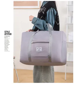 Sac de voyage pliable grande capacité sac bandoulière fourre-tout de rangement gris.