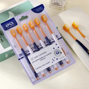 Ensemble de brosses à dents souples pour adultes à tête large pour un soin bucco-dentaire quotidien.