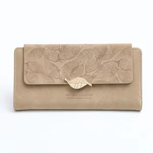 Women's long matte wallet clutch with leaf pattern and gold leaf clasp, large capacity.