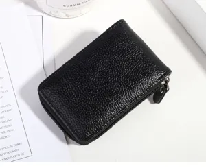 Black lychee pattern mini accordion card holder with zipper closure, compact design.
