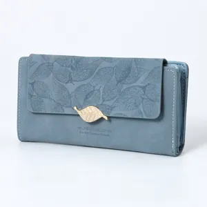 Vintage blue long women wallet with leaf embossed pattern and gold leaf clasp detail.