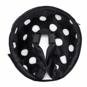Inflatable pet collar detail shot, soft plush polka dot dog recovery cone for comfortable healing.