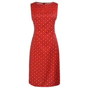 Red sleeveless dress detail showing white geometric print and delicate lace yoke neckline.