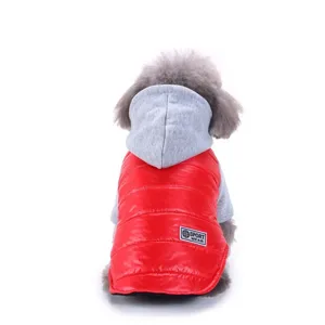 Close-up of pet winter warm vest featuring glossy red fabric and cozy grey hooded design.