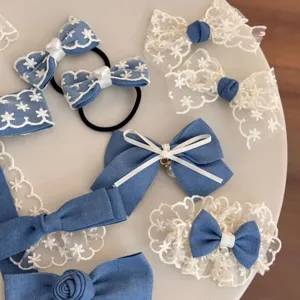 Denim and lace bow hair clip detail, sweet style hair accessories showcasing fabric texture.