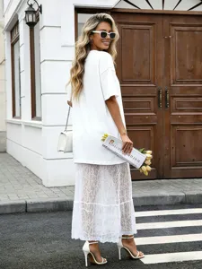 Summer white solid color short sleeve top and sheer lace long dress for women fashion style.