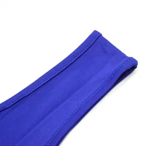 Close-up of blue dress strap, fine stitching, smooth fabric texture, premium casual apparel detail.