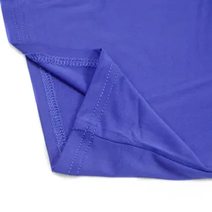 Close-up of blue dress hem, neat stitching, fine fabric texture, summer apparel detail.
