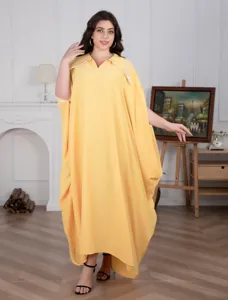 Grote maat gele maxi jurk met vleermuismouwen voor dames, elegante feest kaftan overslag outfit.