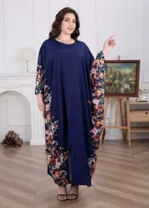 Plus size floral long kaftan dress featuring elegant long sleeves and relaxed loose fit design.