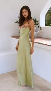 Elegant satin slip dress featuring delicate floral embroidery for women and ladies.