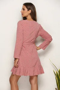 Pink polka dot long sleeve dress with ruffle hem and waist belt, perfect for autumn casual wear.