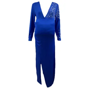 Royal blue long sleeve V-neck maternity dress detail with rhinestones and front slit.