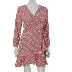 Details of pink polka dot long sleeve wrap dress with elegant ruffle hem for autumn daily wear.