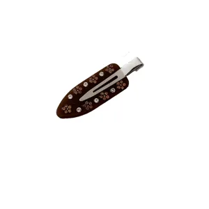 Elegant brown acetate rhinestone hair clip with sparkling crystals for stylish side hairstyles.