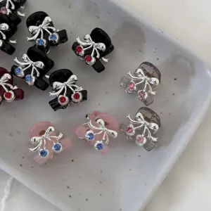 Cute mini rhinestone cherry hair claw clips for women, perfect for bangs and half-up hairstyles.