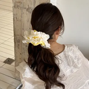 Elegant yellow and white lace hair scrunchie, sweet fabric ponytail holder for women style.