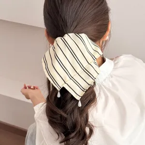 Korean style minimalist striped fabric hair scrunchie for low ponytail, elegant daily accessory.