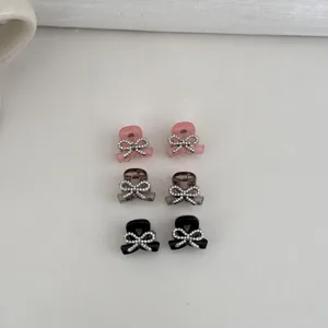 Details of Korean sweet rhinestone bow small hair claws, cute mini claw clips for side hair styling.