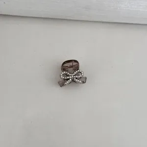 Korean style rhinestone bow hair claw clip detail, exquisite mini side hair accessory for women.