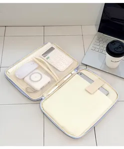 Detail view of multi-functional tablet storage organizer bag with multiple mesh pockets and slots.