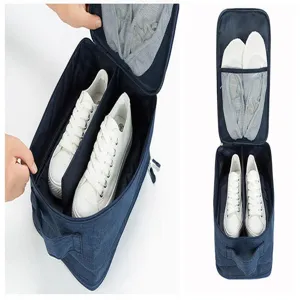 Detailed view of the portable travel shoe bag with multi-compartment storage design.