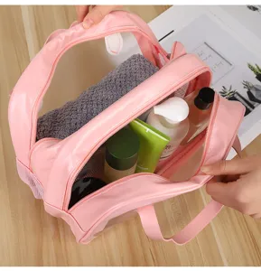 Detail view of the pink double layer waterproof toiletry bag, showcasing transparent PVC design.