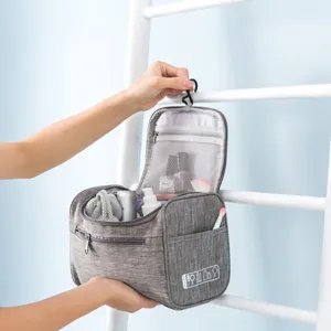 Trousse de toilette suspendue en tissu oxford cationique, idéale pour les voyages et le rangement.