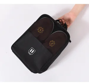 Portable travel shoe bag organizer with breathable mesh window and sturdy handle for luggage.